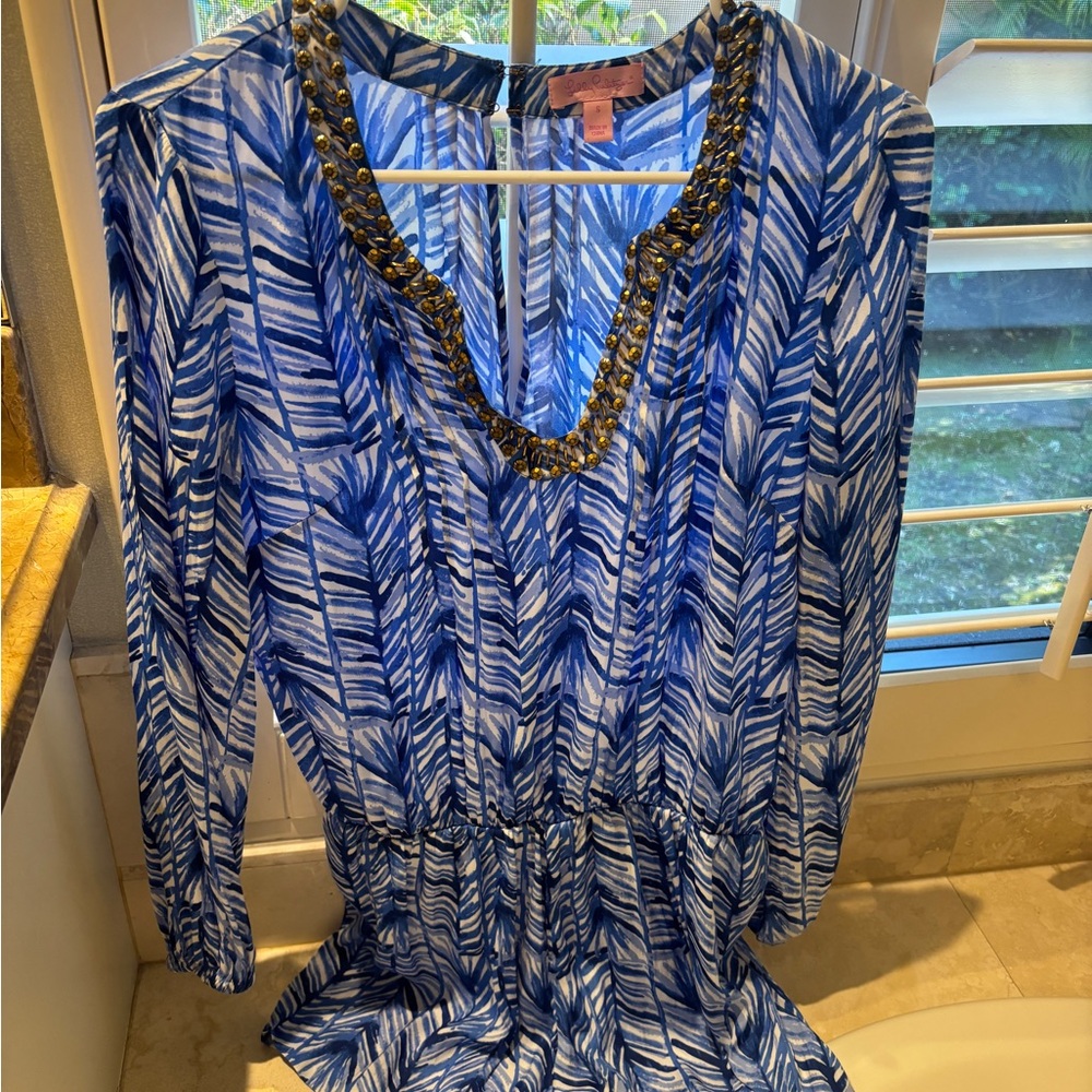 Blue and White Patterned Dress with Gold Accents